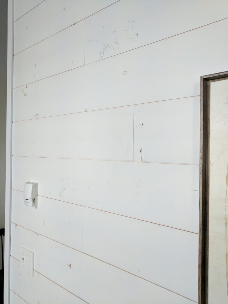 white shiplap walls - Sustainable Lumber Company